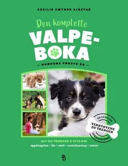 Omslag: "Den komplette valpeboka : hundens første år" av Cecilie Sæther Sjåstad